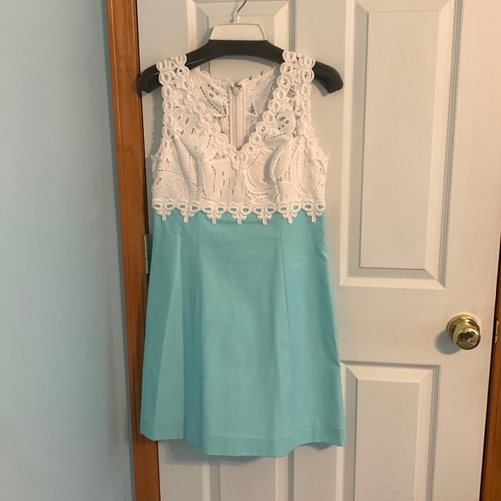 Cute light blue dress with a pattern top